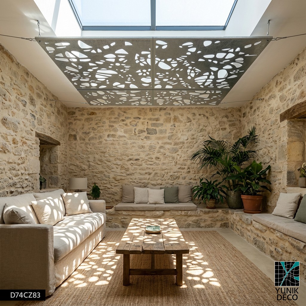 Mise en oeuvre d'un puit de lumière dans un espace troglodyte dans une thématique complètement minérale, conception par Yunik Déco